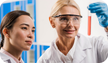 Researchers reviewing a sample